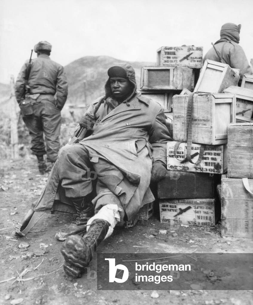 U.S. soldier of the 24th Infantry Regiment wounded in the leg on Feb. 16, 1951. Now regrouped after the failed UN invasion of North Korea, they were blocking the North Korean/Chinese forces advance into South Korea. Korean War, 1950-53