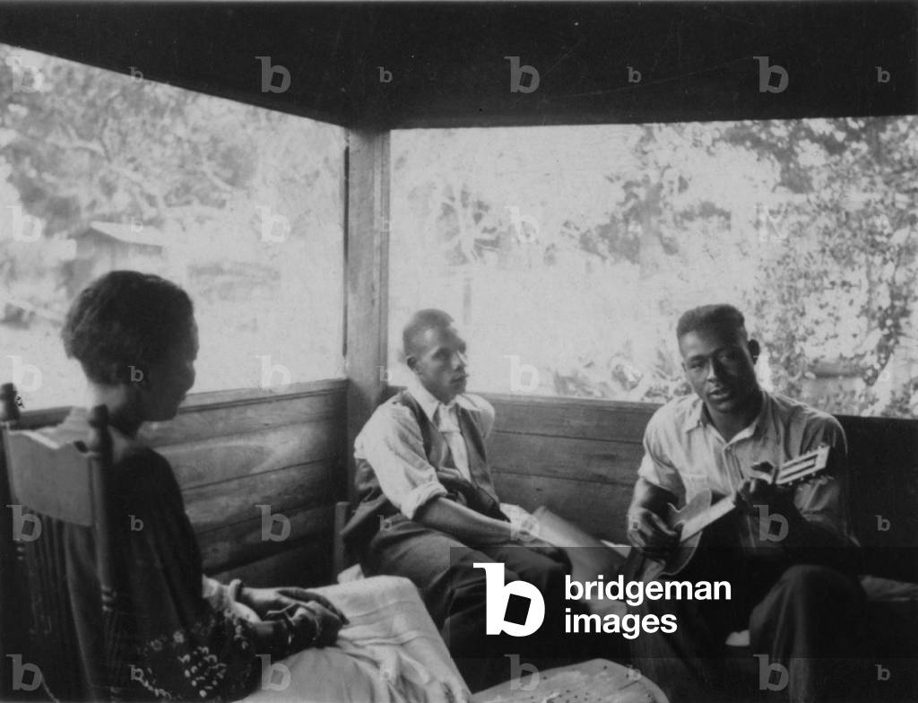 Zora Neale Hurston, Rochelle French, and Gabriel Brown, in Eatonville, Florida during a recording expedition in 1935. Photo by musical folklorist Alan Lomax