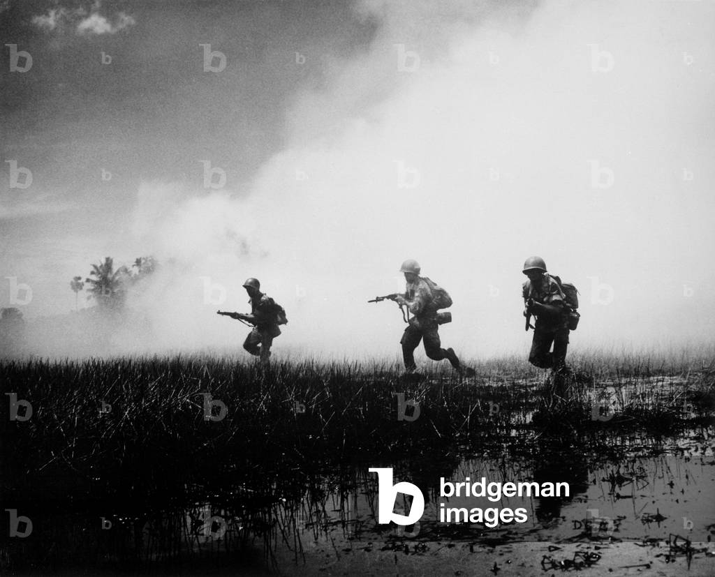 Vietnam War. South Vietnamese troops in combat operations against Communist Viet Cong guerrillas in the marshes of the Mekong Delta. 1961
