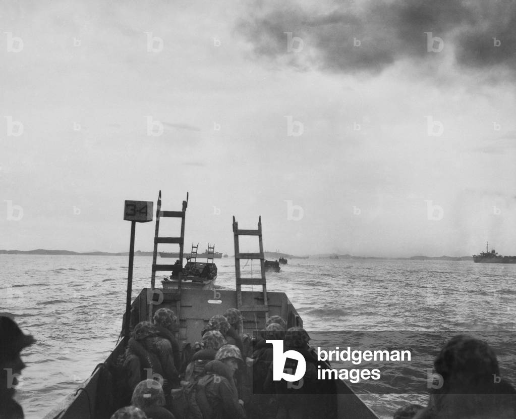 Landing craft loaded with U.S. Marines heads for the seawall at Inchon. They carry scaling ladders to climb over the 8 foot high seawall in their landing zone, Red Beach. Sept. 15, 1950. Korean War, 1950-53