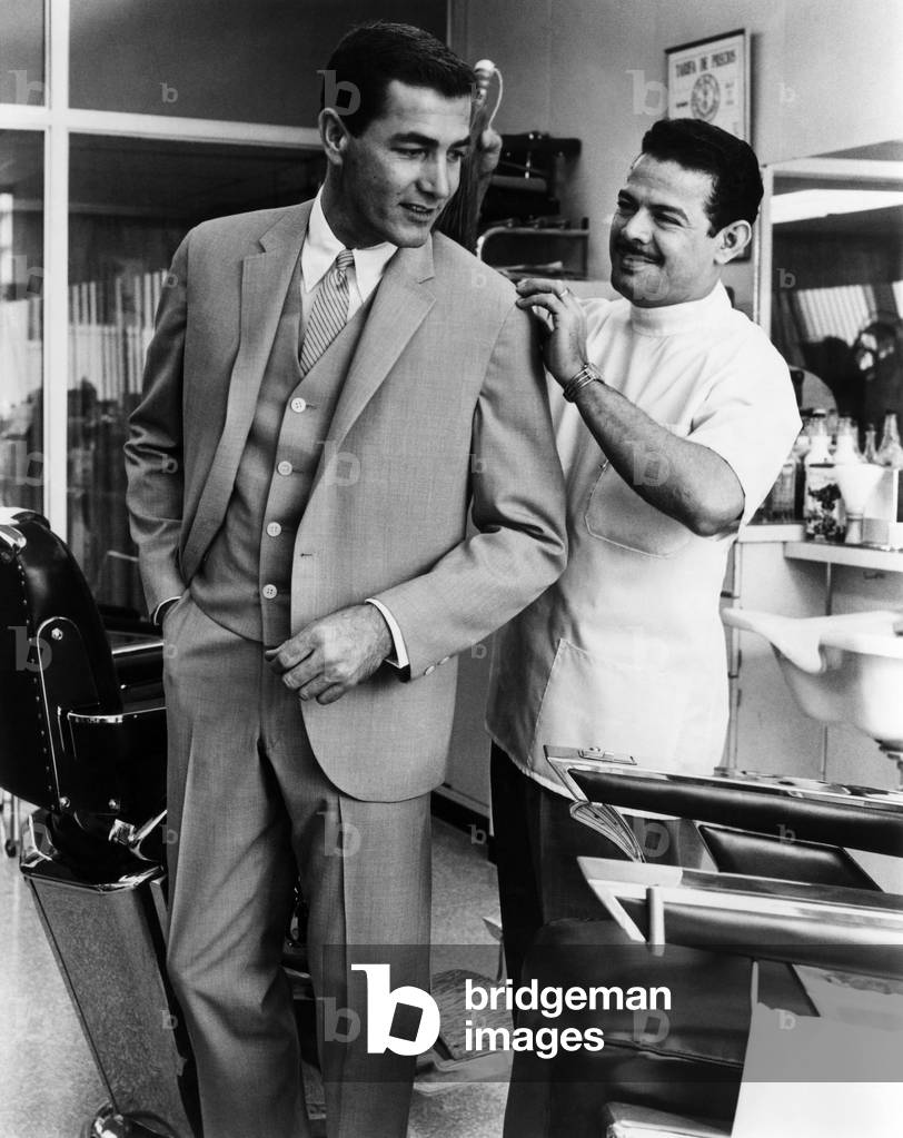 A man models a suit designed by Andrew Pallack, c.1962