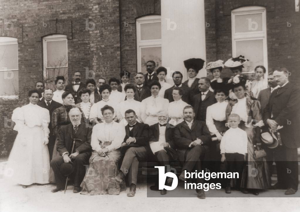 Tuskegee Institute faculty with their patron Andrew Carnegie at Tuskegee Alabama 1906. Seated in front row L to R R.C. Ogden Mrs. Booker T. Washington Booker T. Washington Andrew Carnegie and an unidentified person