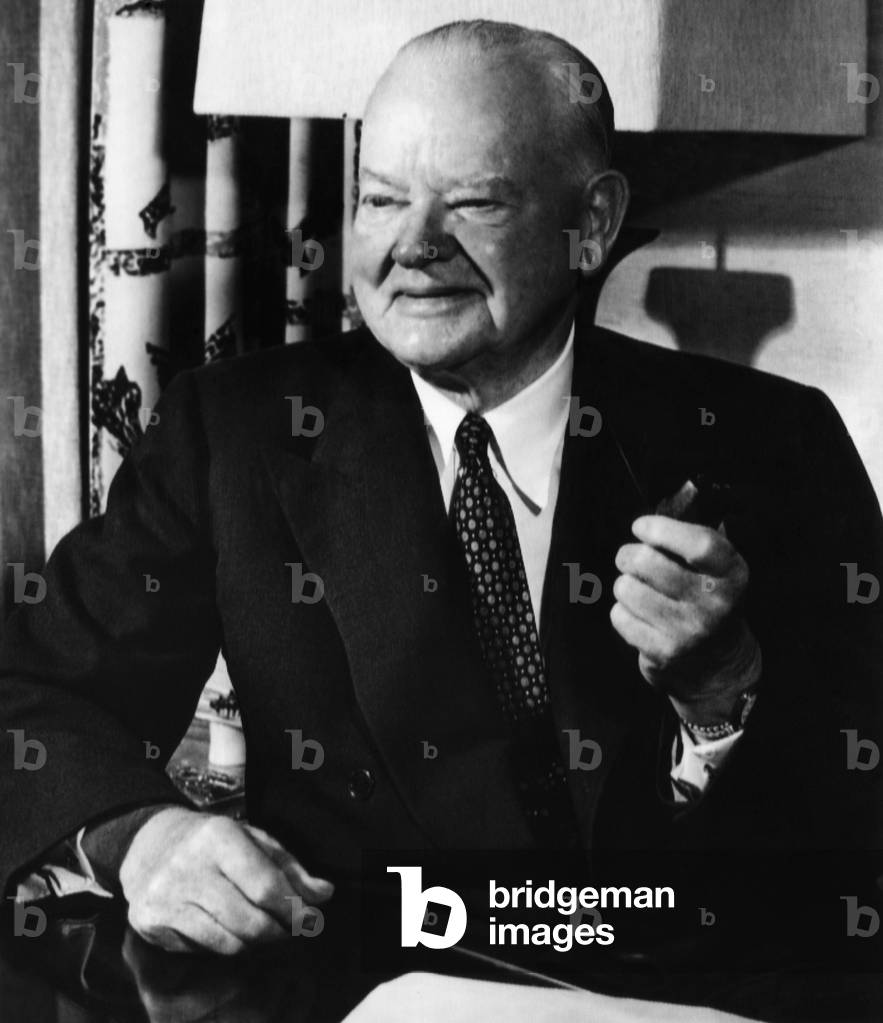 Former President Herbert Hoover (1874-1964), U.S. President 1929-1933, at his desk in his suite at the Mark Hopkins hotel, San Francisco, California, August 9, 1956