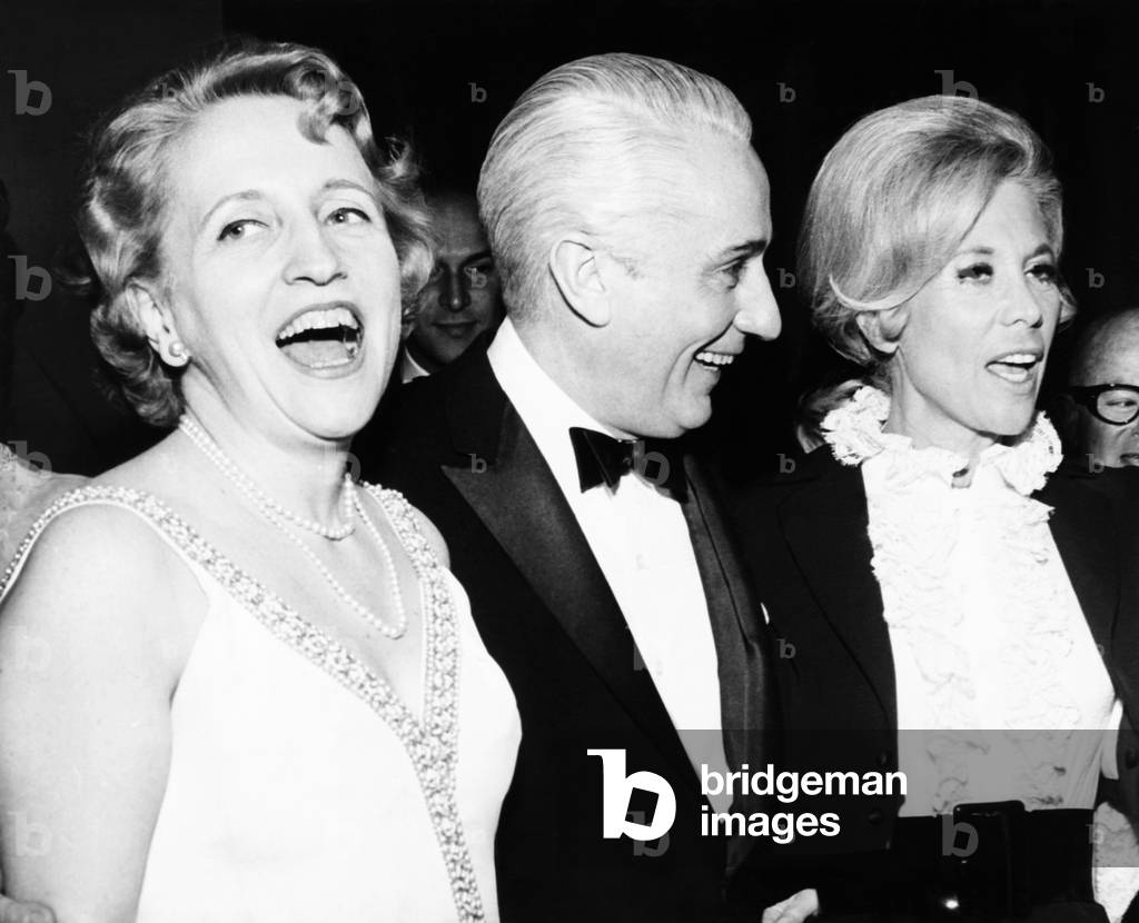 Margaret Truman Daniel and husband Clifton with entertainer Dinah Shore at her new supper club. Clifton Daniel was managing editor of the NY Times. New York City, Feb. 19, 1968