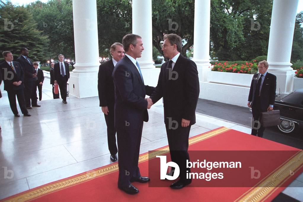 Pres. George W. Bush greets PM Tony Blair at the White House on Sept. 20, 2001. Blair would be in the audience with the First lady, during Bush 43's speech to a Joint Session of Congress that night. Operation Enduring Freedom combat in Afghanistan would start on October 7, 2001 and Britain would provide significant military support and troops