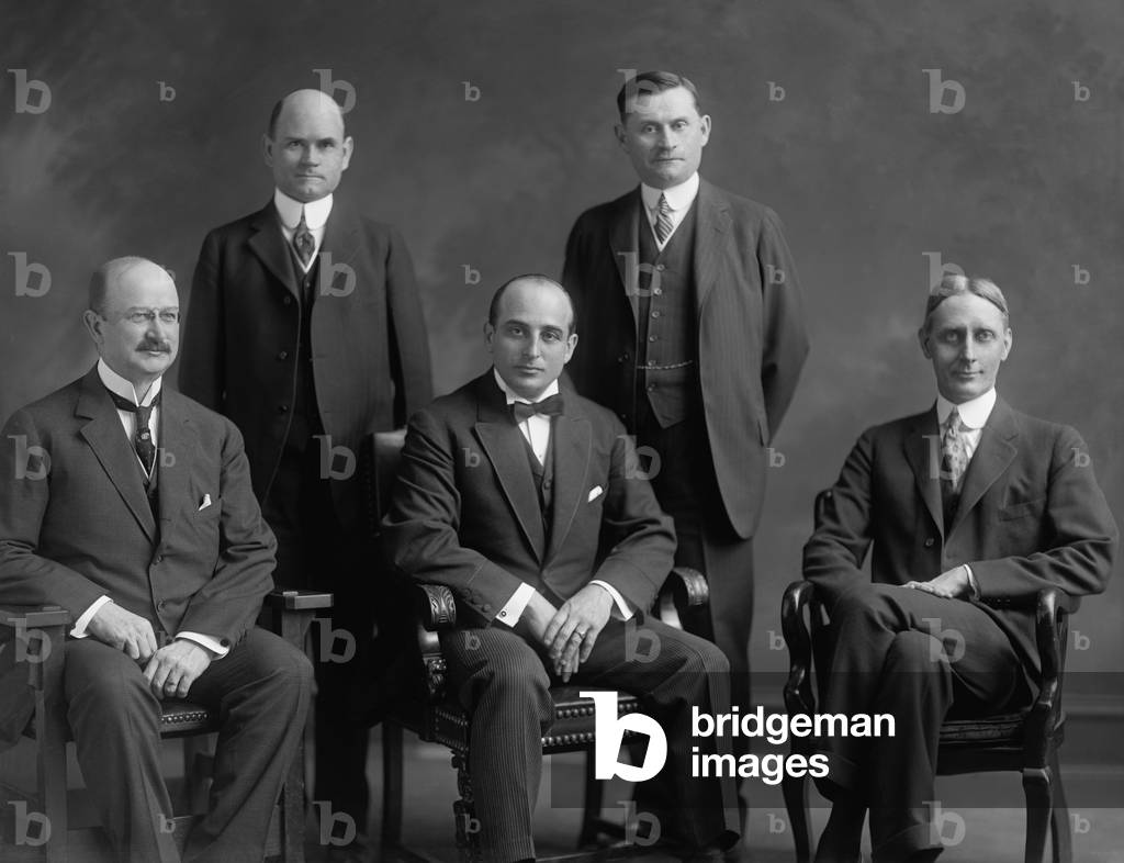 The Federal Trade Commission FTC was established in 1914 as a successor to Theodore Roosevelt's Bureau of Corporations. The FTC had five members authorized to issue Cease and Desist orders to large corporations to curb unfair trade practices. L-R Will H. Parry William J. Harris Joseph E. Davies Edward N. Hurley George Rublee. c. 1915
