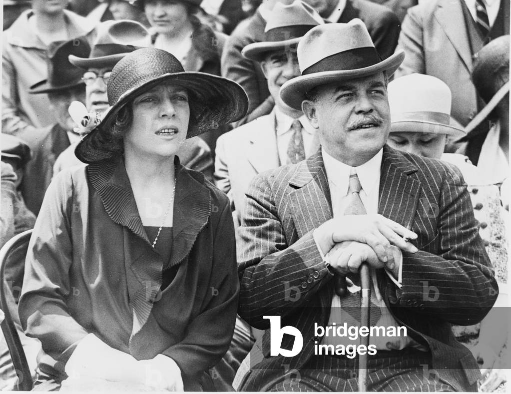 Representative and Mrs. Nicholas Longworth (Alice Roosevelt) on the Capitol steps, as they watched the Indians from Arizona put on their snake dance. Nicholas Longworth was the Republican Speaker of the House from 1925-31