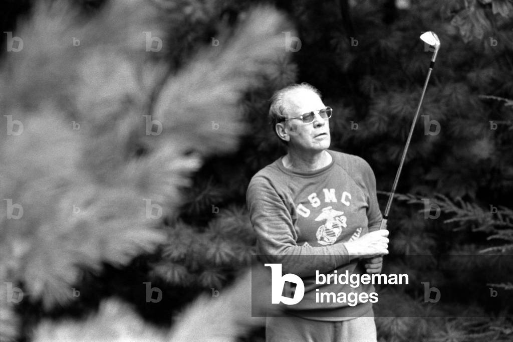 President Ford golfing on a Labor Day week-end trip to Camp David. Sept. 2 1974
