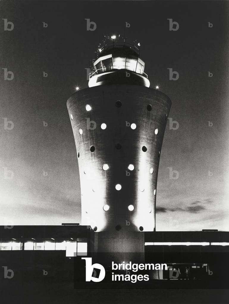 La Guardia Airport control tower, constructed in 1962. Designed by Wallace K. Harrison, its futuristic design would be at home with the Trylon and Perisphere he designed for the 1939 Worlds Fair. In 2010 it was replaced by a new tower with advanced electronics and better views of the runways.