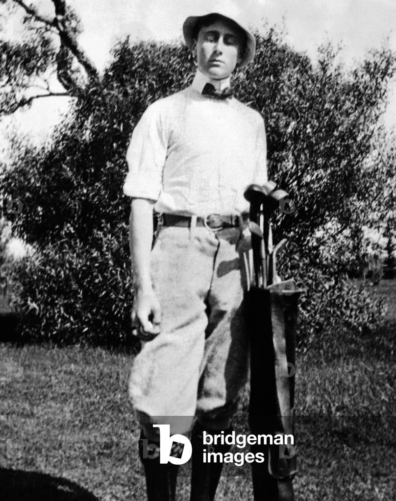 Young Franklin Roosevelt at on a golf course at age 17. c. 1899