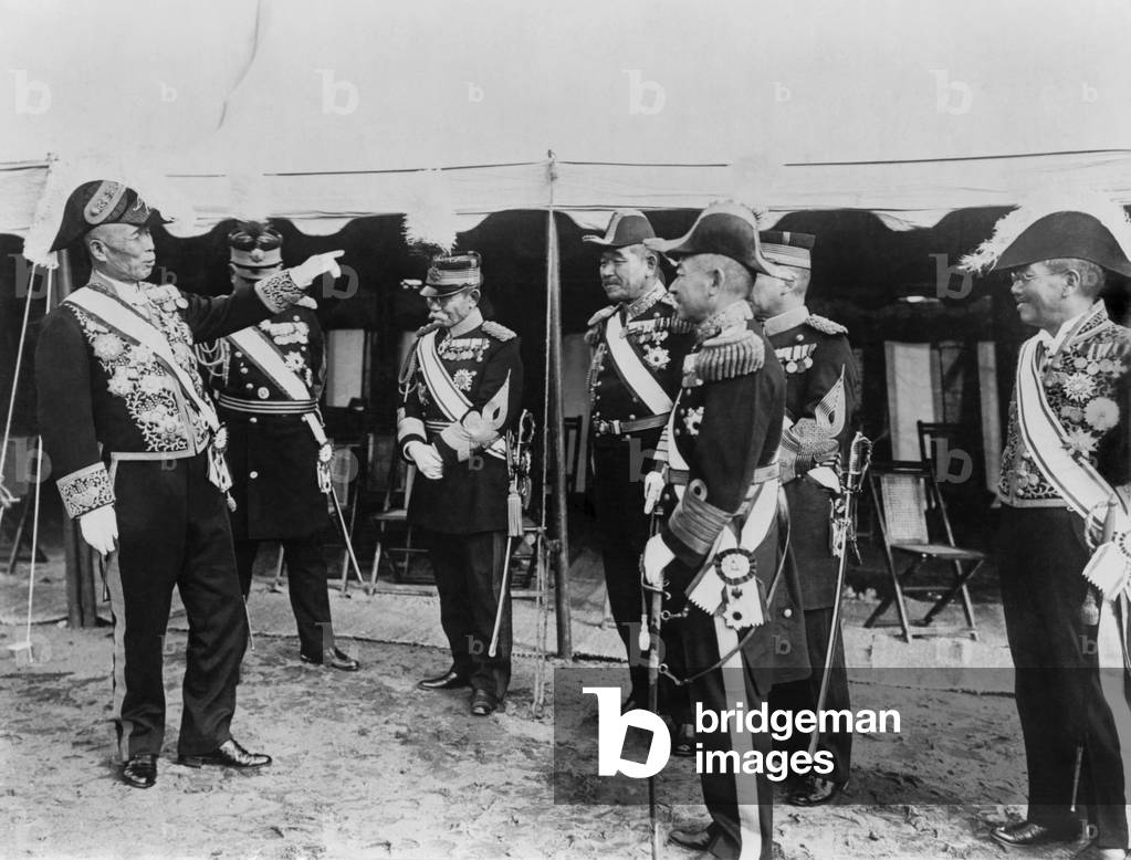 Baron Tanaka, Japan's Premier (left) and other members of the cabinet. The occasion is the first army review of the year by Emperor Hirohito, Tokyo. c. 1927