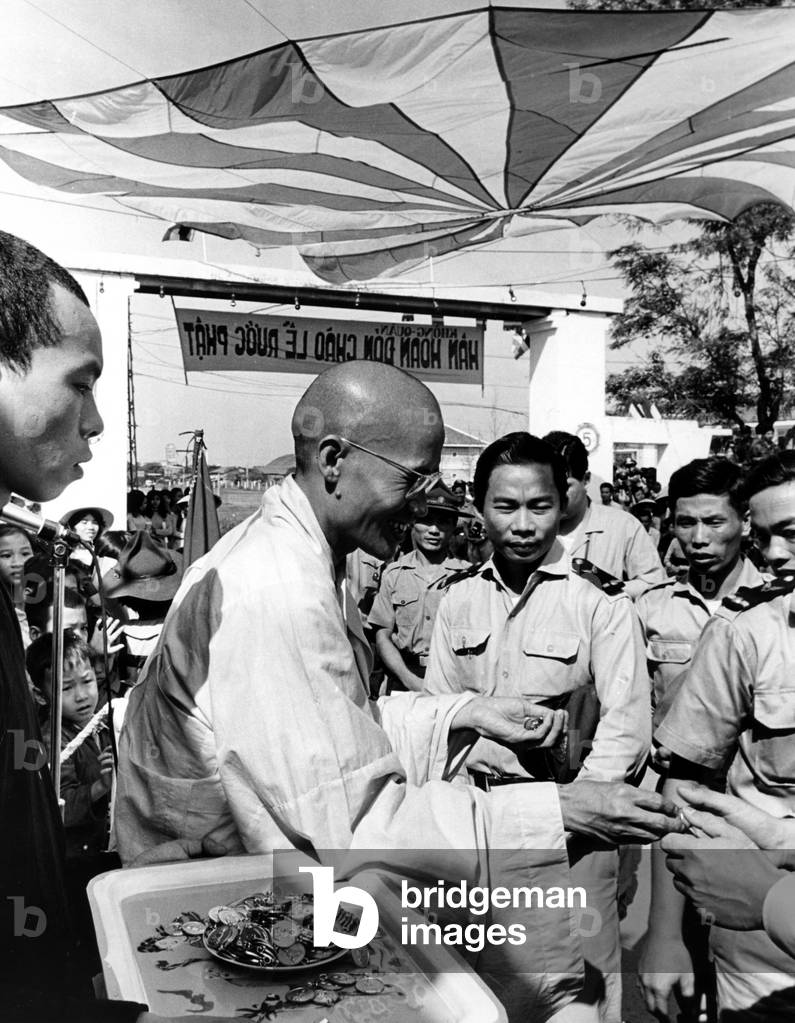 Buddhist Leader Thich Tam Chau officiates at Inauguration of a Buddhist Chaplain's Corps. in the Vietnamese Air Force. Tan Son Huut Airbase, Saigon, Vietnam, 01-15-1963.