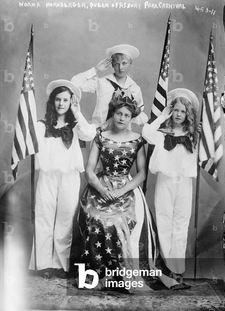 Asbury Park, Norma Hornberger (front center), queen of the Asbury Park Carnival, surrounded by three saluting children, New Jersey, August 24, 1908