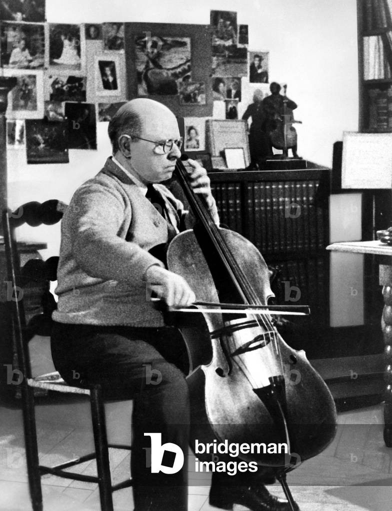 Pablo Casals, c.1955. Practicing in his study.