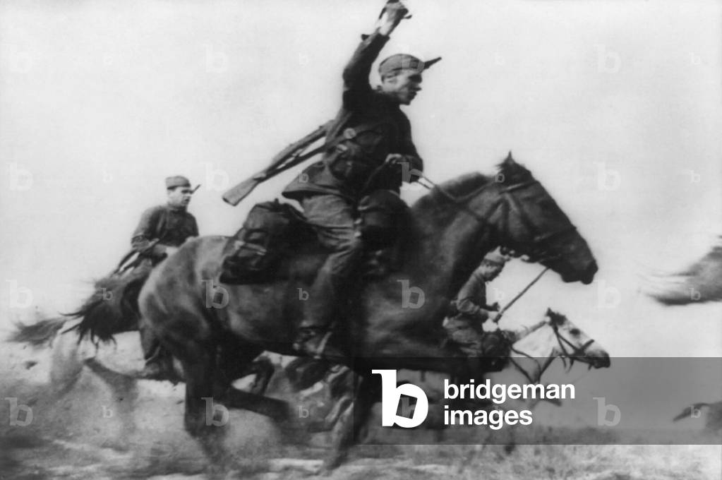 A Cavalry troop of the Red Army attacking the German infantry at the Soviet war front, c. 1941. After Russia lost most of its motorized equipment in the German invasion, mounted infantry were used in the Battle of Moscow