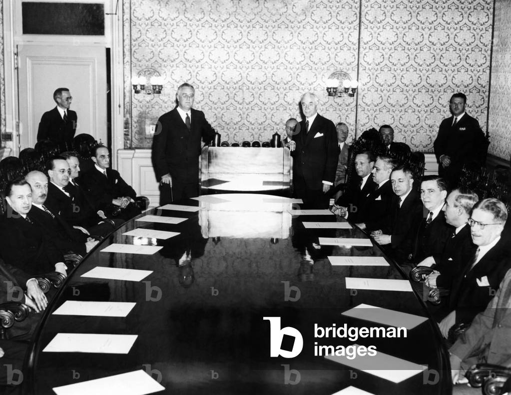 President Franklin Roosevelt (standing left) and Secretary of State Cordell Hull (standing right), addressed the board of Governors of the Pan American Union, April 14, 1937