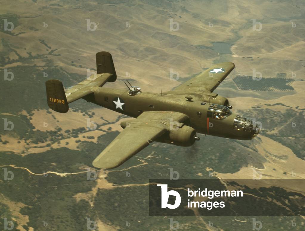 North American Aviation's B-25 Mitchell bomber in flight during World War 2. The medium bomber was named after U.S. military aviation pioneer, Billy Mitchell. Oct. 1942