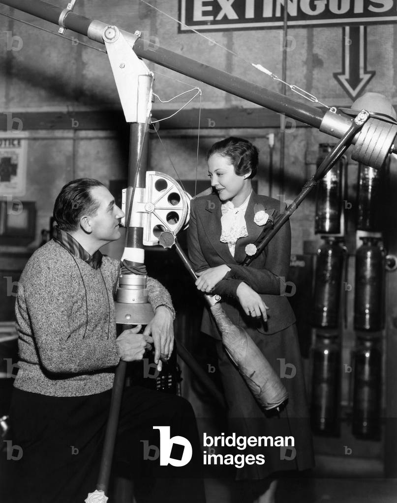 THE FURY, director Fritz Lang and actress Sylvia Sidney, on set, 1936
