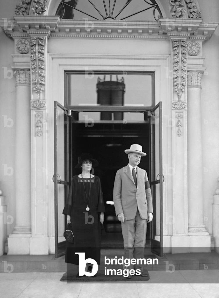 President Calvin Coolidge and the First Lady Grace Coolidge at the White House. Aug. 21, 1923. She is dressed in black and he wears a mourning armband for the late President Warren Harding who died on Aug. 2, 1923