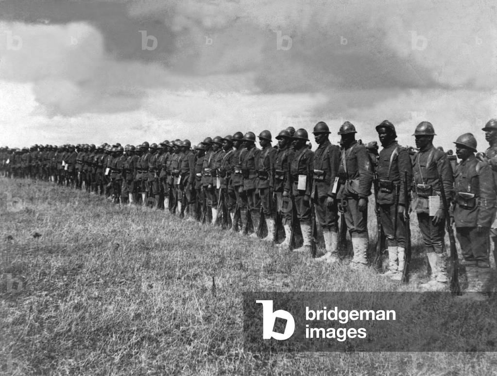 African American troops in France during World War I. Part of the 15th Regiment Infantry New York National Guard, which has been under fire. c. 1918
