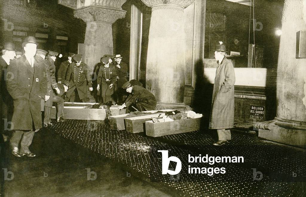 Triangle Shirtwaist fire victims in coffins on the sidewalk. 146 women seamstresses died, mostly immigrants, many jumping from the upper two floors of an eight story building. March 15, 1911