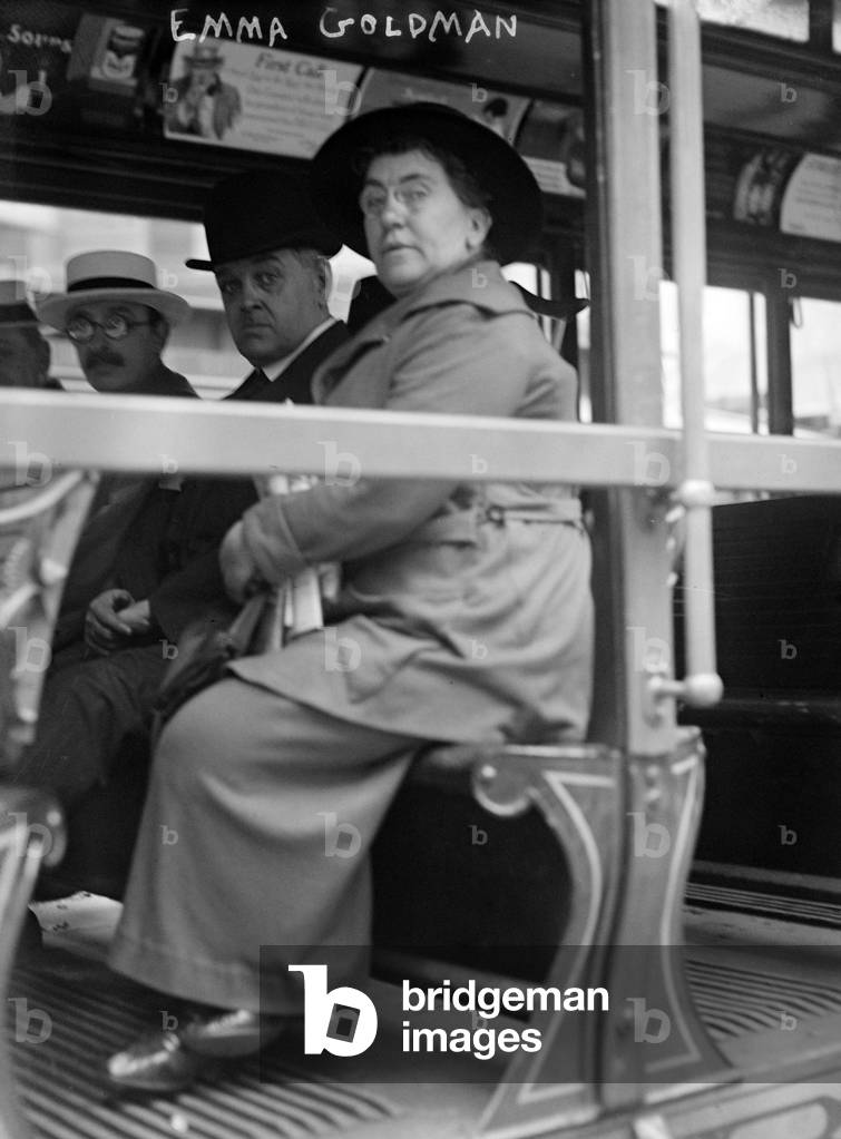 Emma Goldman and Alexander Berkman (with glasses) on a streetcar in San Francisco. Anarchists and radical revolutionaries, they were deported in 1919. photo 1917