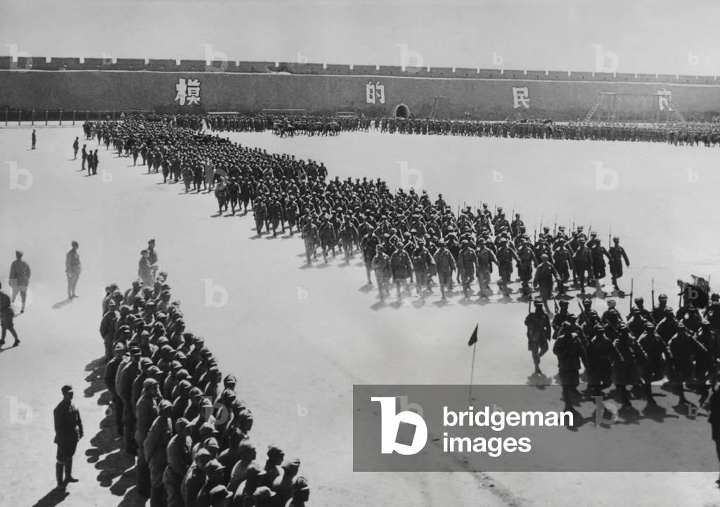 Presentation of 12,000 Nationalist Chinese Troops in Ninghaia to U.S. Gen. Claire Chennault. The Nationalist Chinese Muslim Army, was ready to confront the People's Liberation Army. May 4, 1949. As a Communist victory in the Chinese Civil War became inevitable, the desperate Kuomintang recruited Khampa soldiers in southwest China.