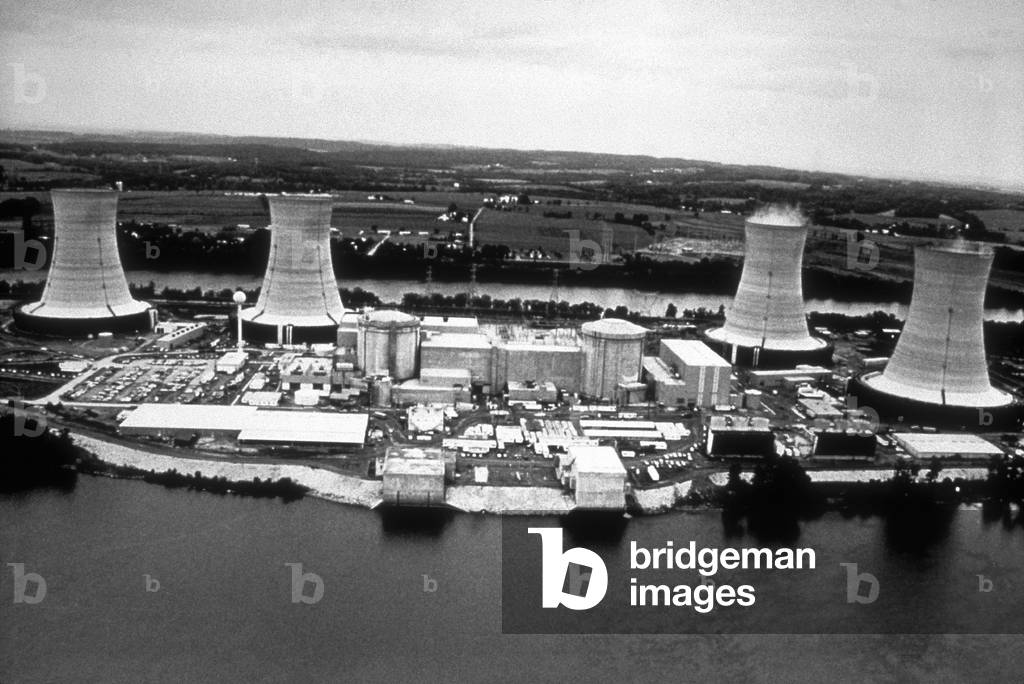 Three Mile Island. TMI was the site of a partial meltdown on March 28, 1979. Pre-accident photo shows the four cooling towers and the two domed containment buildings for the TMI-1 (center left) and TMI-2 (center right) reactors. The accident caused no death or injuries, but halted all new nuclear power plants in the US for three decades