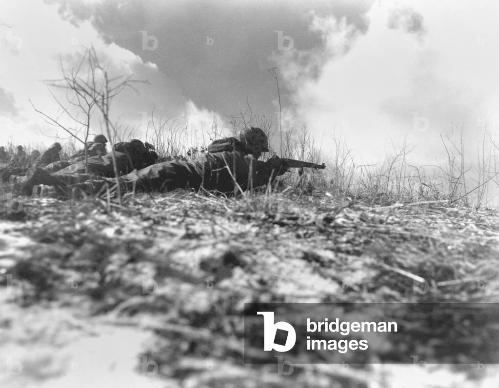U.S. Marines trying to contact temporarily cut-off Fox Company in the Battle of Yudam-Ni on the Chosin Reservoir. Dec. 1-3, 1950. They were attempting to support the withdrawal of the 5th and 7th Marines from Yudam-ni. Korean War, 1950-53