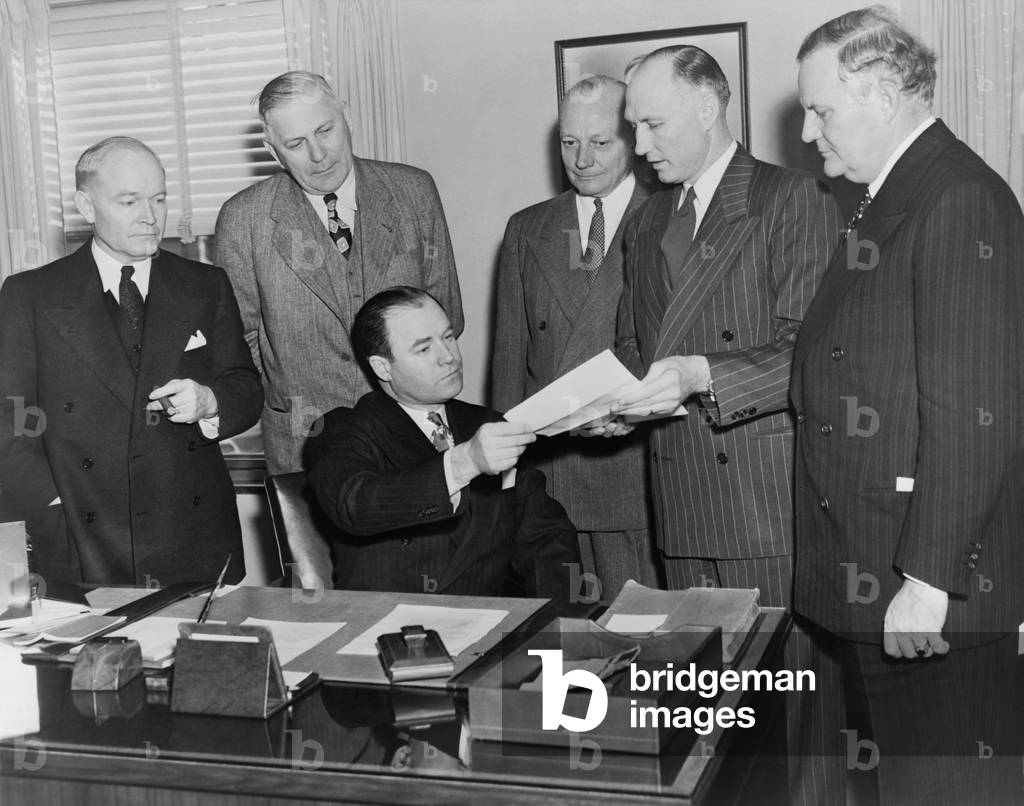 Senator Howard McGrath (seated), demands withdrawal of President Truman's civil rights program. Feb. 2, 1948. McGrath was Chairman of the Democratic National Committee. With him are Southern Governors: Ben Laney, Arkansas; R. Gregg Cherry, North Carolina; William Lane, of Maryland; Strom Thurmond, South Carolina; and B.H. Jester, Texas