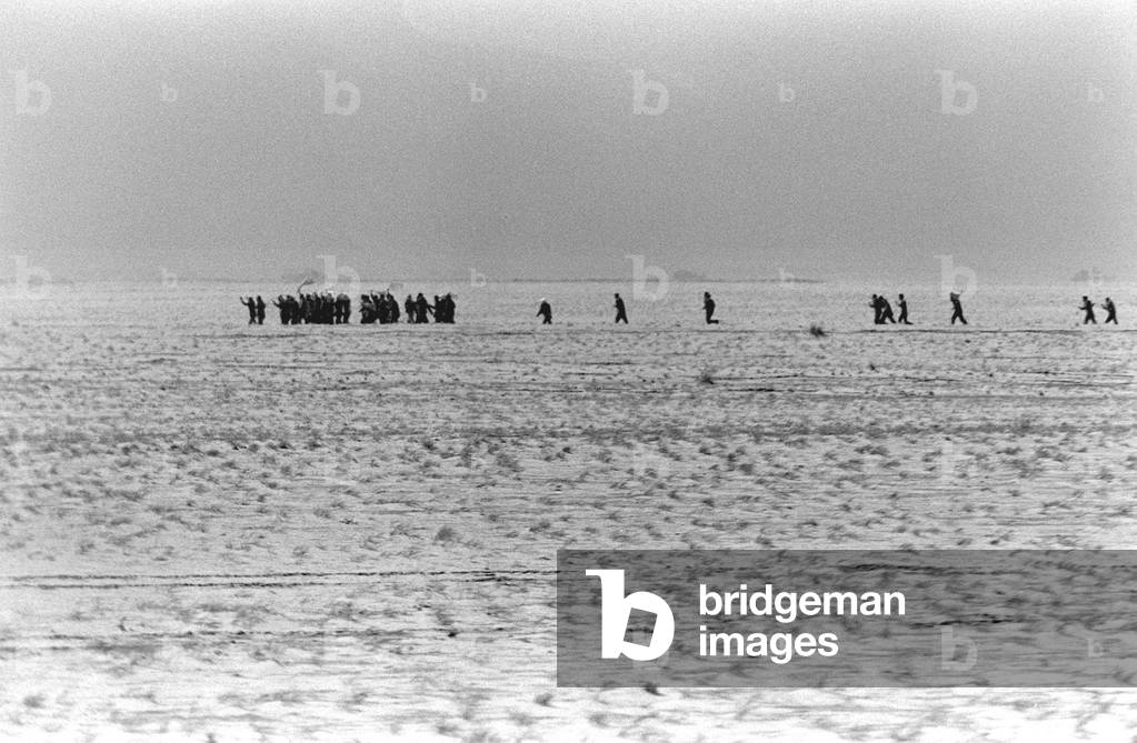 Iraqi soldiers surrender to the 1st Marine Division during the third day of the ground war of Operation Desert Storm. Feb. 26 1991