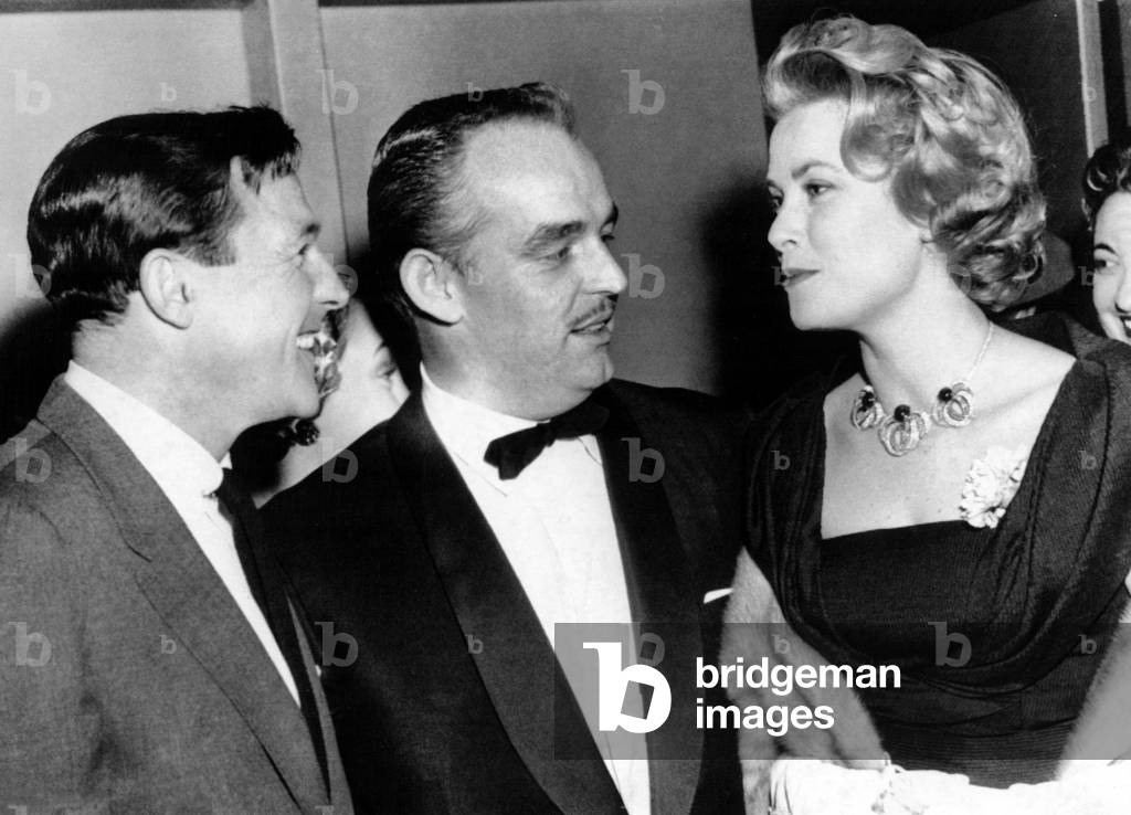 Gene Kelly welcomes guests Prince Rainier and Grace Kelly to his New York production of FLOWER DRUM SONG, December 6, 1958
