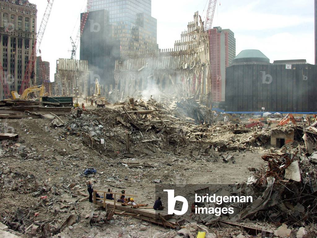 Pile of debris from the South Tower of World Trade Center a month after the terrorist attack. Oct. 10, 2001. The pile is reduced after a month of recovery operations searched for remains of the 479 firemen, police, and building workers lost when the WTC 2 collapsed. New York City, after September 11, 2001 terrorist attacks