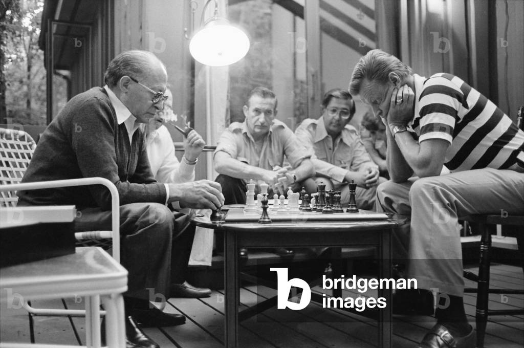 Menahem Begin and Zbigniew Brzezinski play chess during the Camp David Summit. Sept 5-17 1978