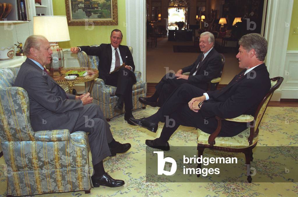 Three former presidents Gerald Ford George H.W. Bush and Jimmy Carter join President Bill Clinton at the White House for the signing the U.S. legislation to implement the North American Free Trade Agreement NAFTA . Sept. 14 1993