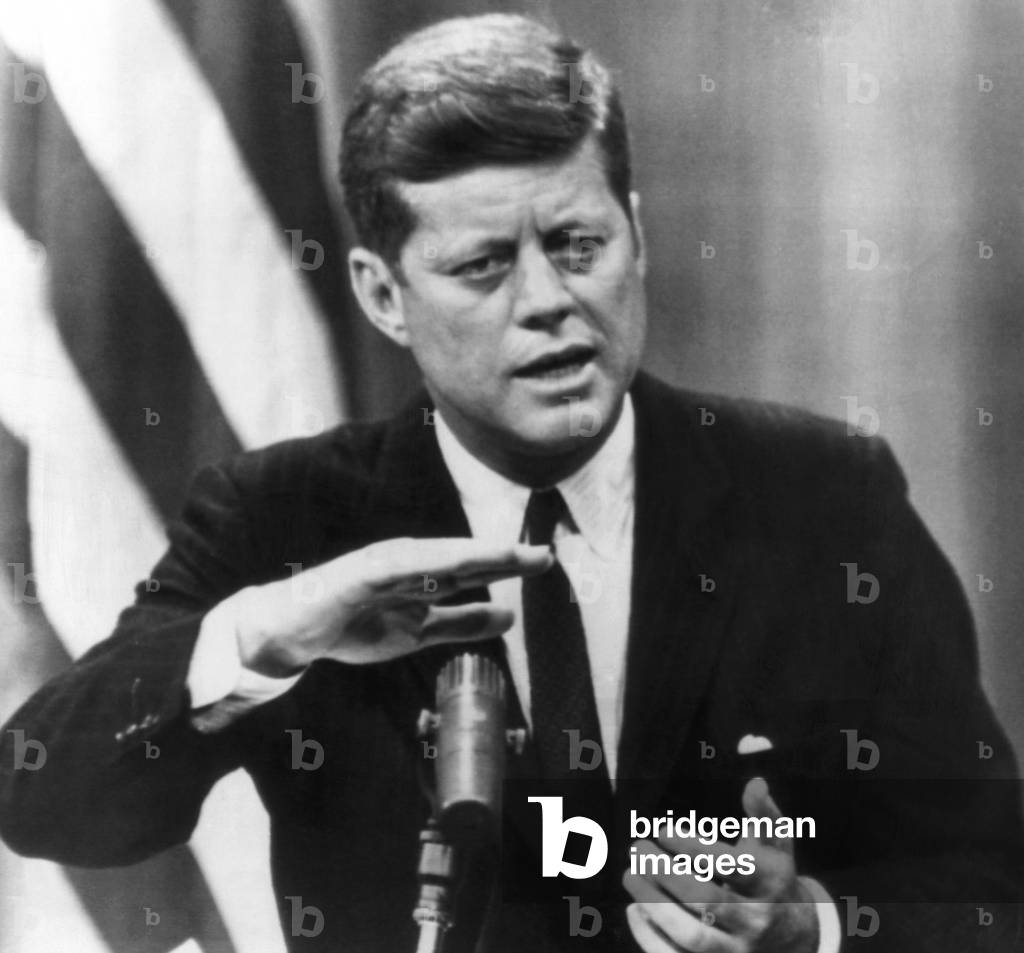 John F. Kennedy, called on Russia to halt interference in the Berlin air corridors while the Geneva talks were in progress. He also criticized those who would cut his foreign aid budget. May 12, 1963