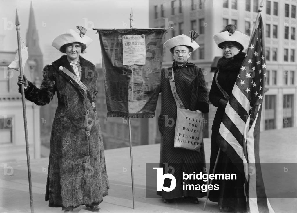 Three suffragettes demonstrate in New York City to promote Suffrage Hike of 1912 from Manhattan to Albany and distribute their VOTES FOR WOMEN PILGRIM leaflets. Left to right: Mrs. J. Hardy Stubbs, Miss Ida Craft, Miss Roaslie Jones