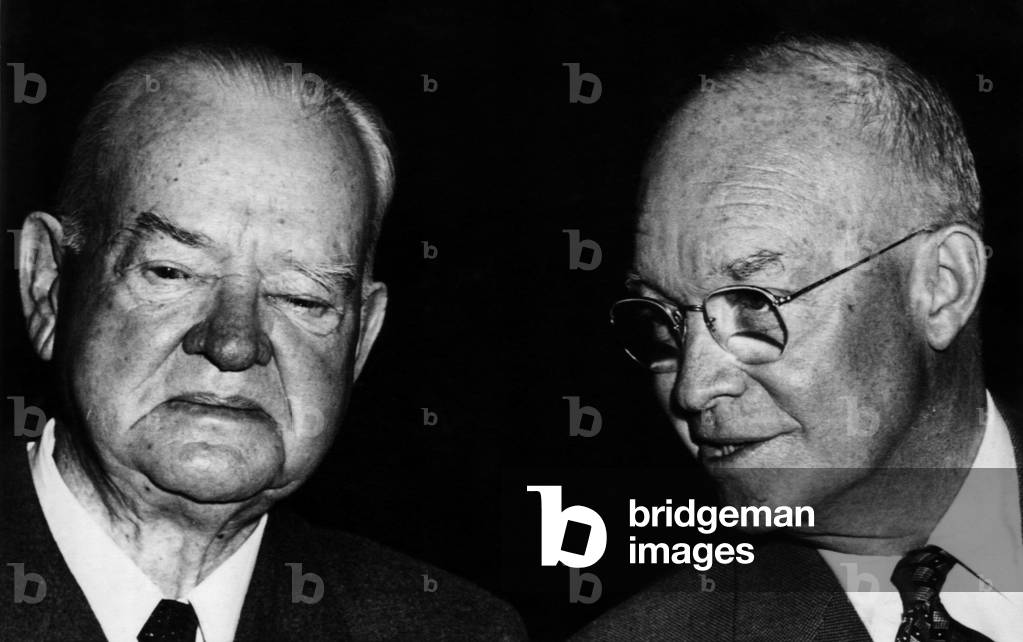 Former President Herbert Hoover, and President Dwight D. Eisenhower, at a lunch in honor of Hoover, February 4, 1957