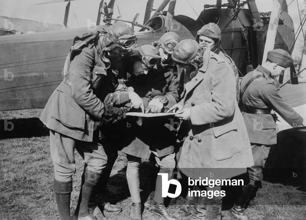British WW1 flyers consultation prior to taking to the air. 1915-18