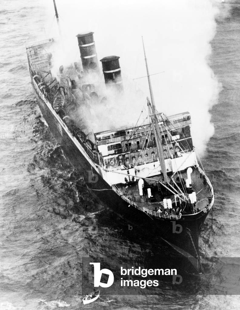 Luxury Liner Morrow Castle, smoldering off Asbury Park, New Jersey. On its final Havana to New York voyage, a storm and ship fire resulted in the death of 135 passengers and crew. September 1934