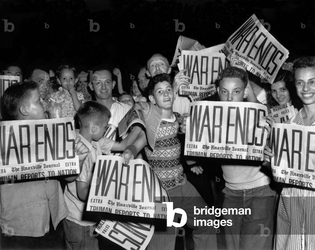'WAR ENDS' headlines on Knoxville Journal of Aug. 14, 1945. Citizens of Oak Ridge, Tennessee, celebrate V-J Day (Victory Over Japan). World War 2