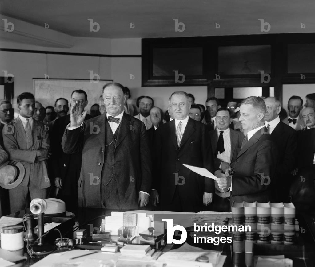 Former President William Howard Taft being sworn in as Chief Justice of the Supreme Court. July 11, 1921. This was the position he wanted above all others, including the Presidency