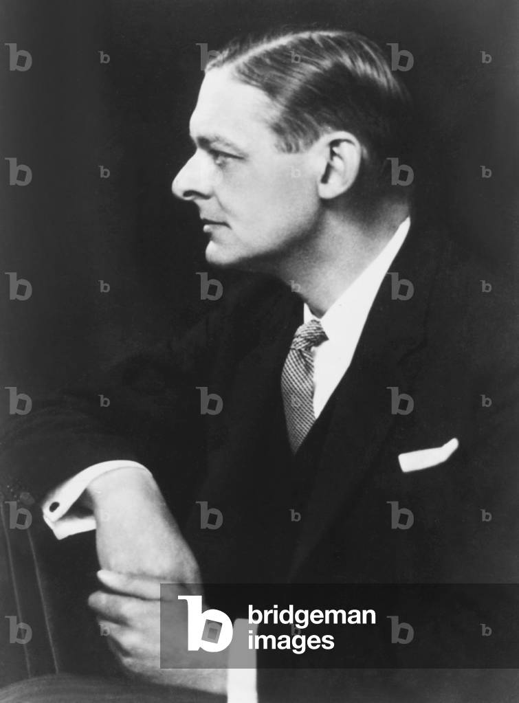 T. S. Eliot, American born British poet, critic and dramatist. Photo by Elliott & Fry, c. 1925. -