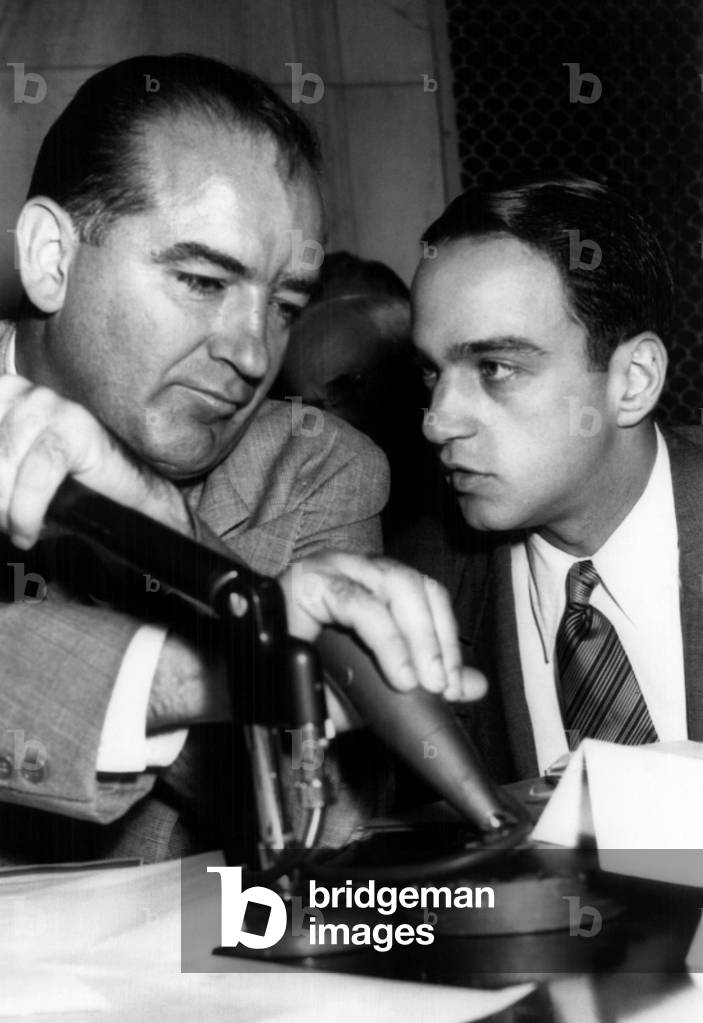 Senator Josephn McCarthy confers with his attorney, Roy Cohn, during the Army-McCarthy hearings, 1954