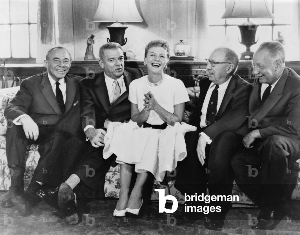 Mary Martin (1913-1990), surrounded by her collaborators prior to the opening of the classic musical comedy, THE SOUND OF MUSIC IN 1959. Left to right: Richard Rodgers, Oscar Hammerstein, Mary Martin, Russel Crouse, Howard Lindsay