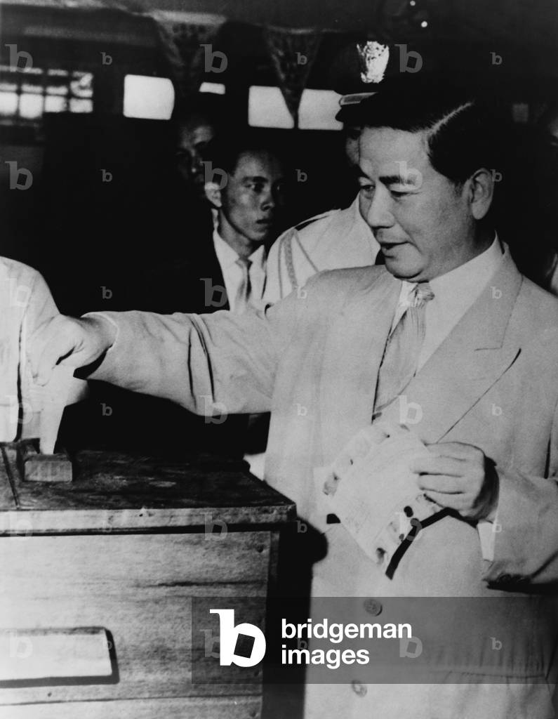 Ngo Dinh Diem (1901-1963), the first President of South Vietnam, casting ballot in Saigon in 1961. His failure to allow nationwide elections as agreed in the 1954 Geneva Accords, provoked the long civil war between North and South Vietnam