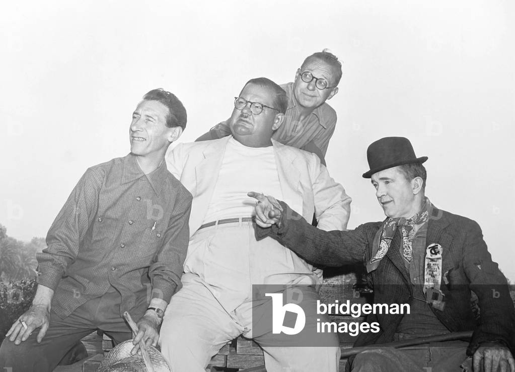 THE FLYING DEUCES, from left: Charley Rogers, Oliver Hardy, Harry Langdon, Stan Laurel on set, 1939