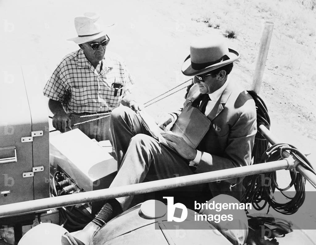 THE BIG COUNTRY, from left: director William Wyler, Gregory Peck on set, 1958