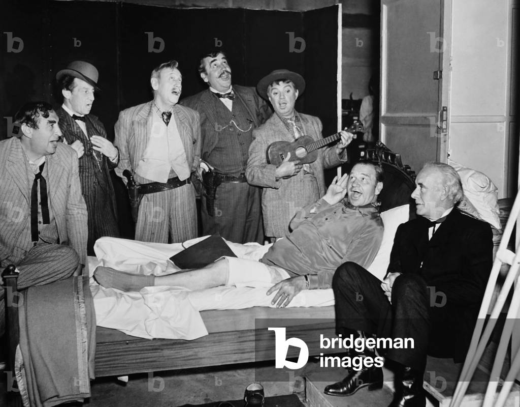 THE BAD MAN OF BRIMSTONE, from left; Mitchell Lewis, Raymond Hatton, Charley Grapewin, Noah Beery, Cliff Edwards, Wallace Beery, Lewis Stone after Wallace's accident on set, 1937