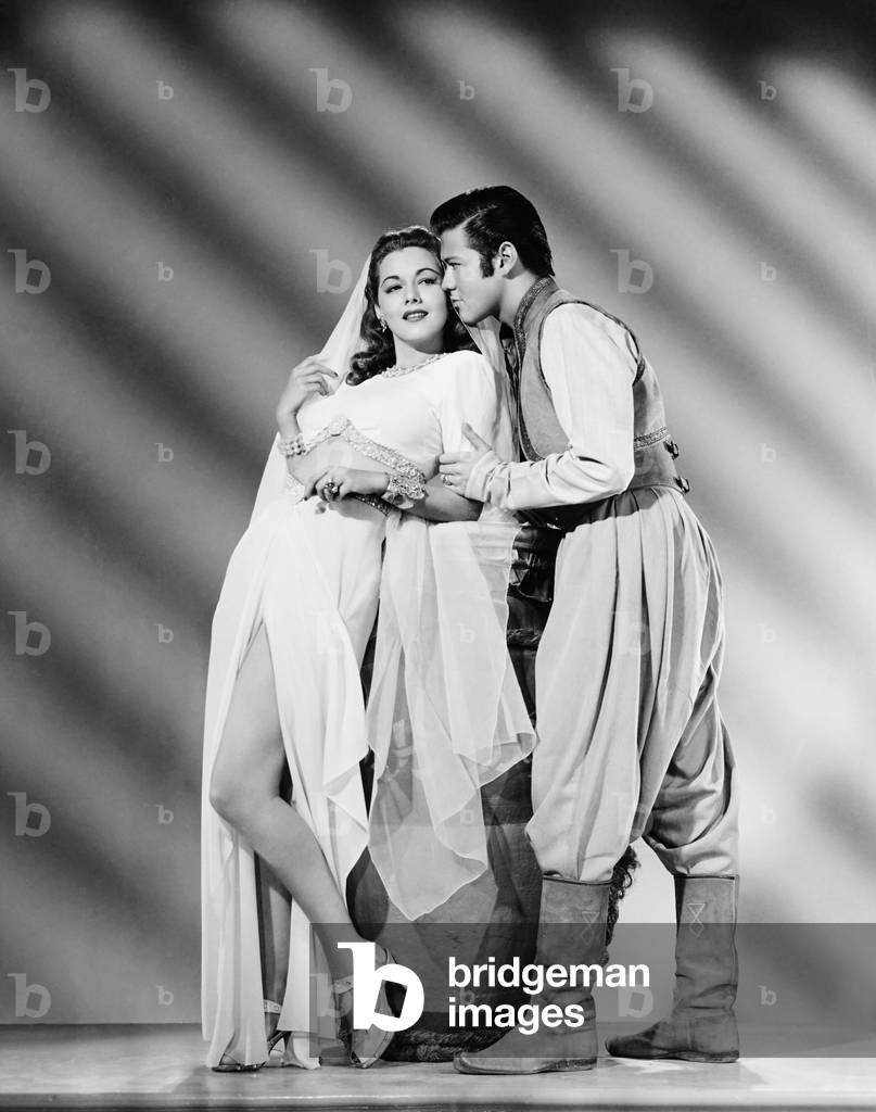 ALI BABA AND THE FORTY THIEVES, from left: Maria Montez, Turhan Bey, 1944